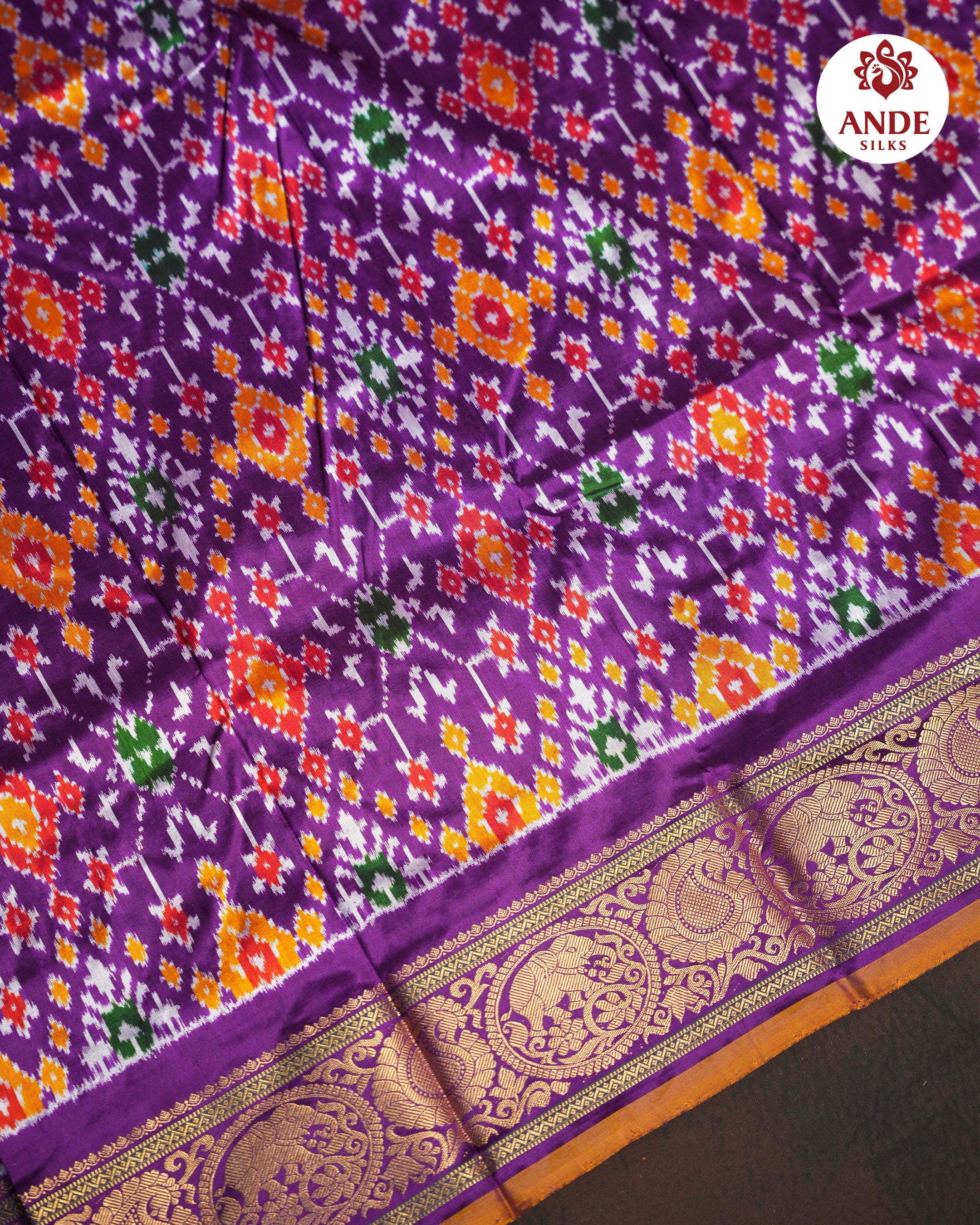 Pink Ikkat Kanchi Border Pattu Saree with Traditional Zari Border