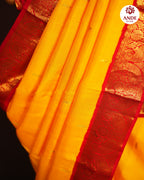 Kanchi Pattu Saree in Yellow with Traditional Zari Border