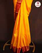 Kanchi Pattu Saree in Yellow with Traditional Zari Border