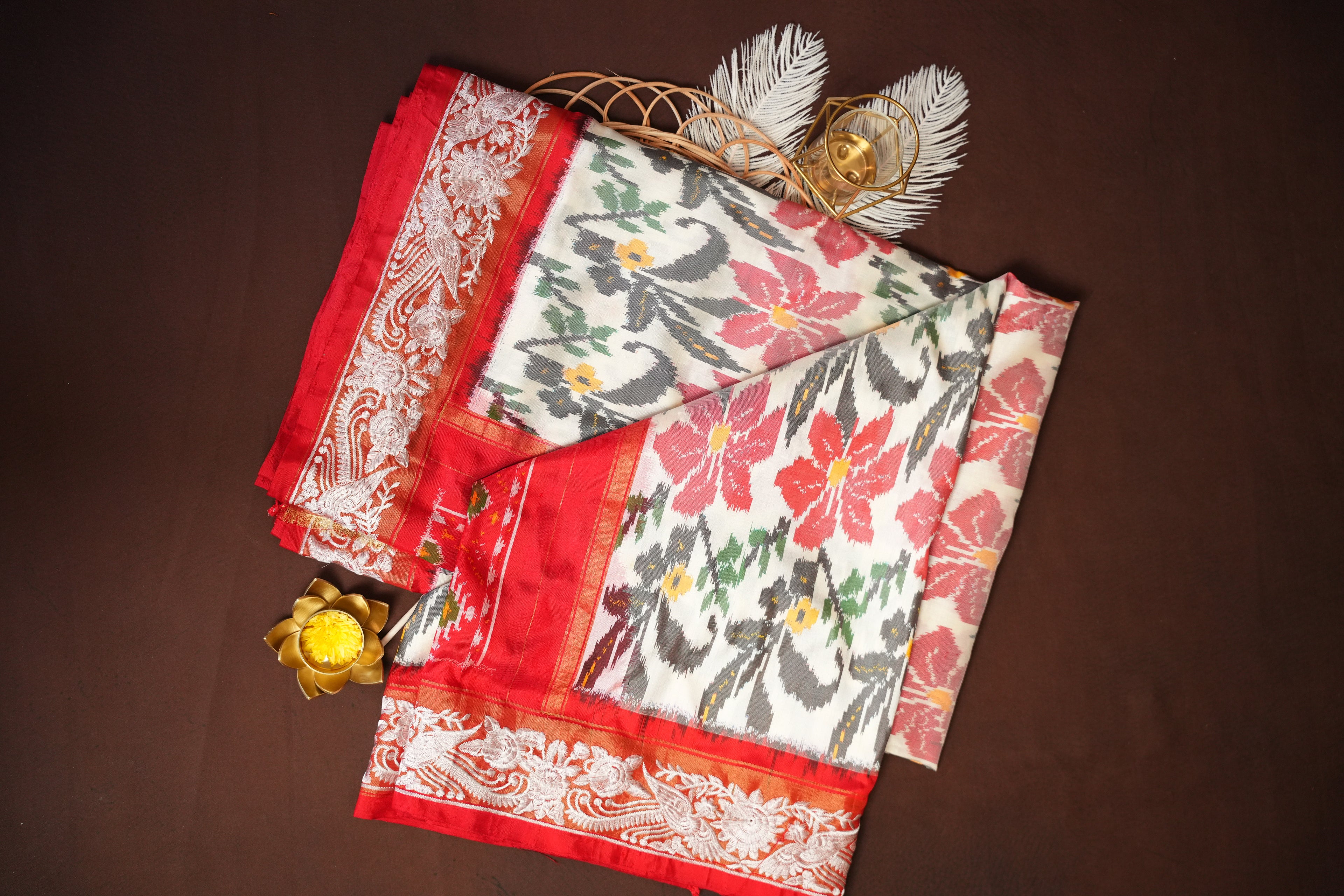 IKKAT Work Designer Saree with Floral Patterns & Contrast Border | Ande Silks