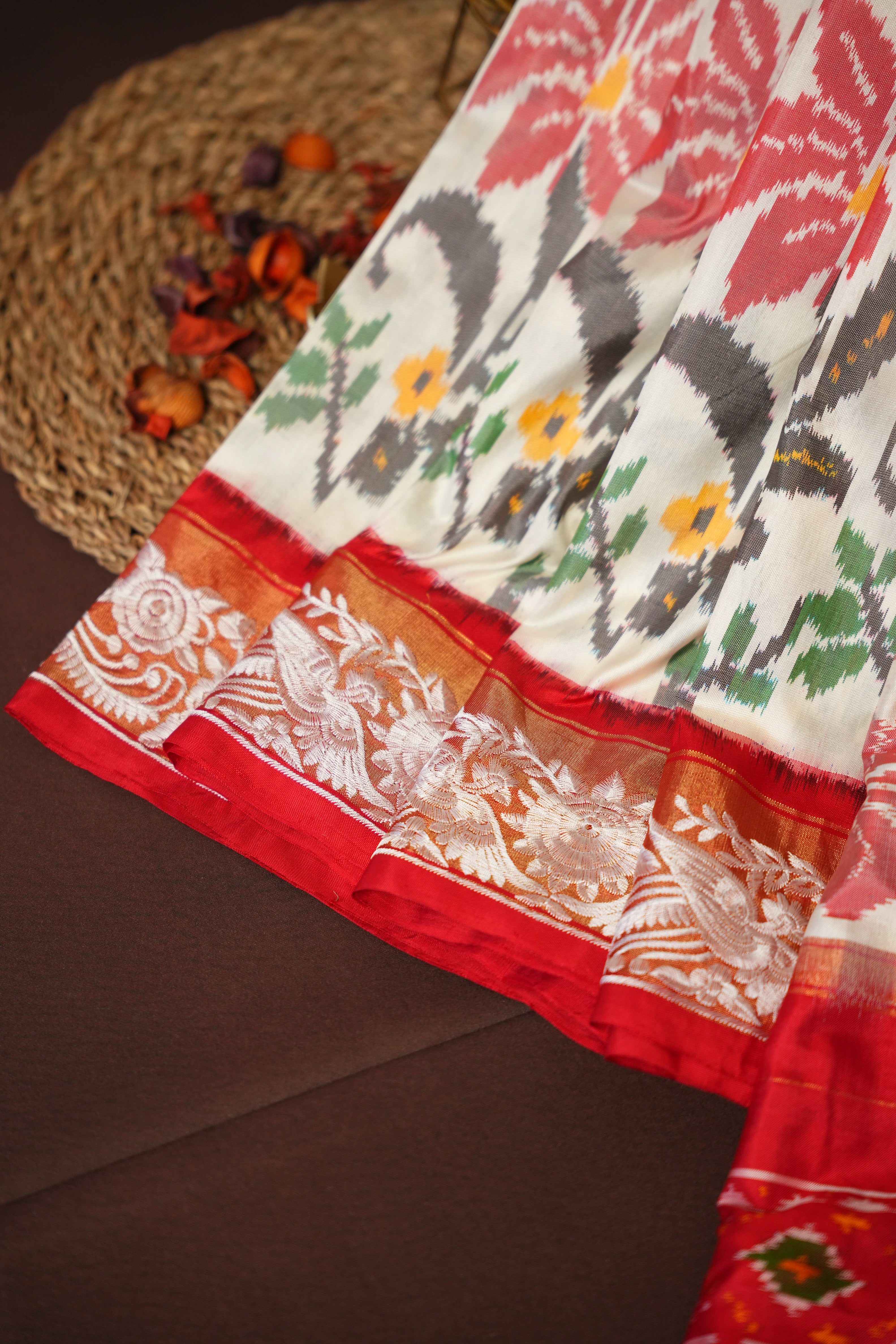 IKKAT Work Designer Saree with Floral Patterns & Contrast Border | Ande Silks