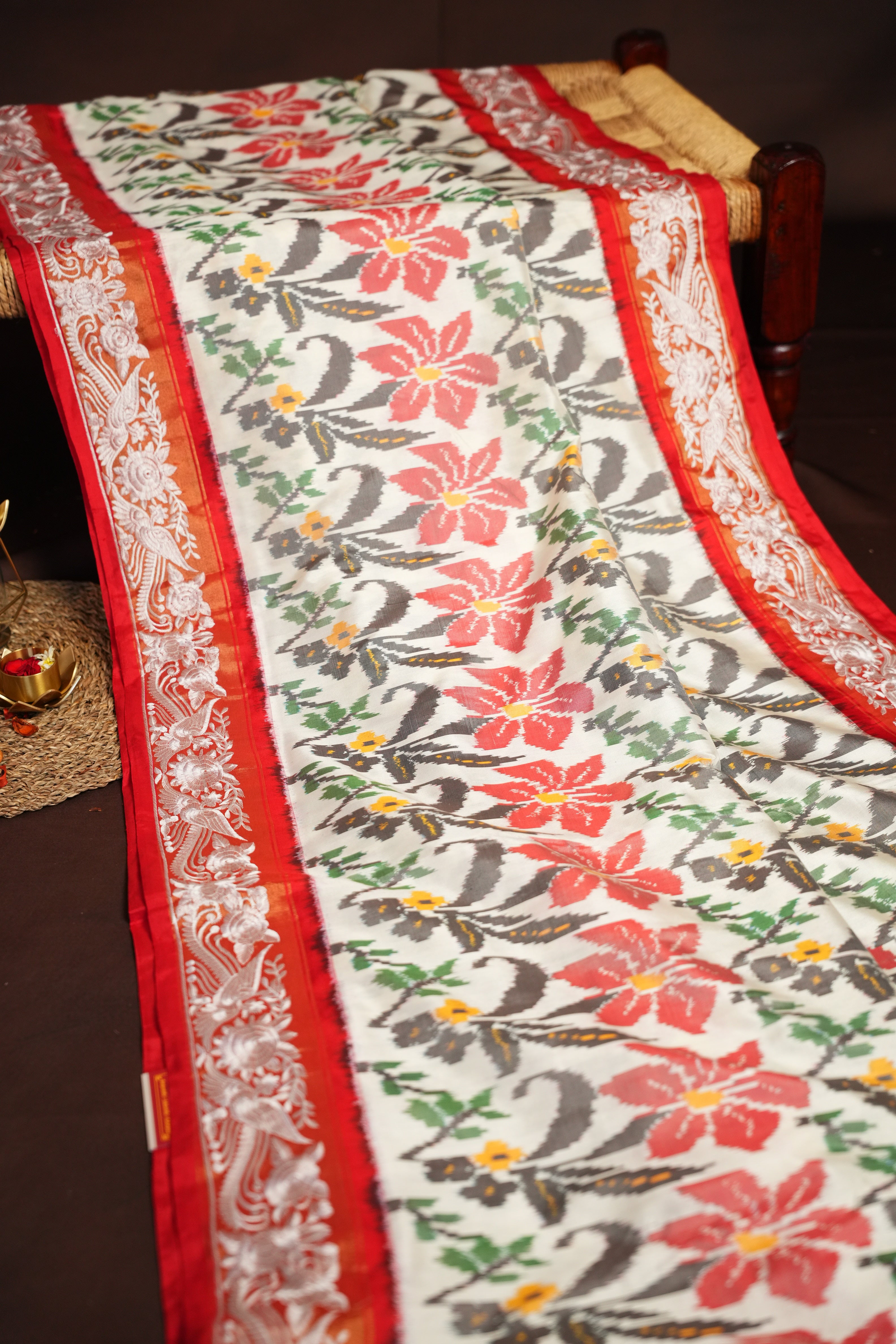 IKKAT Work Designer Saree with Floral Patterns & Contrast Border | Ande Silks