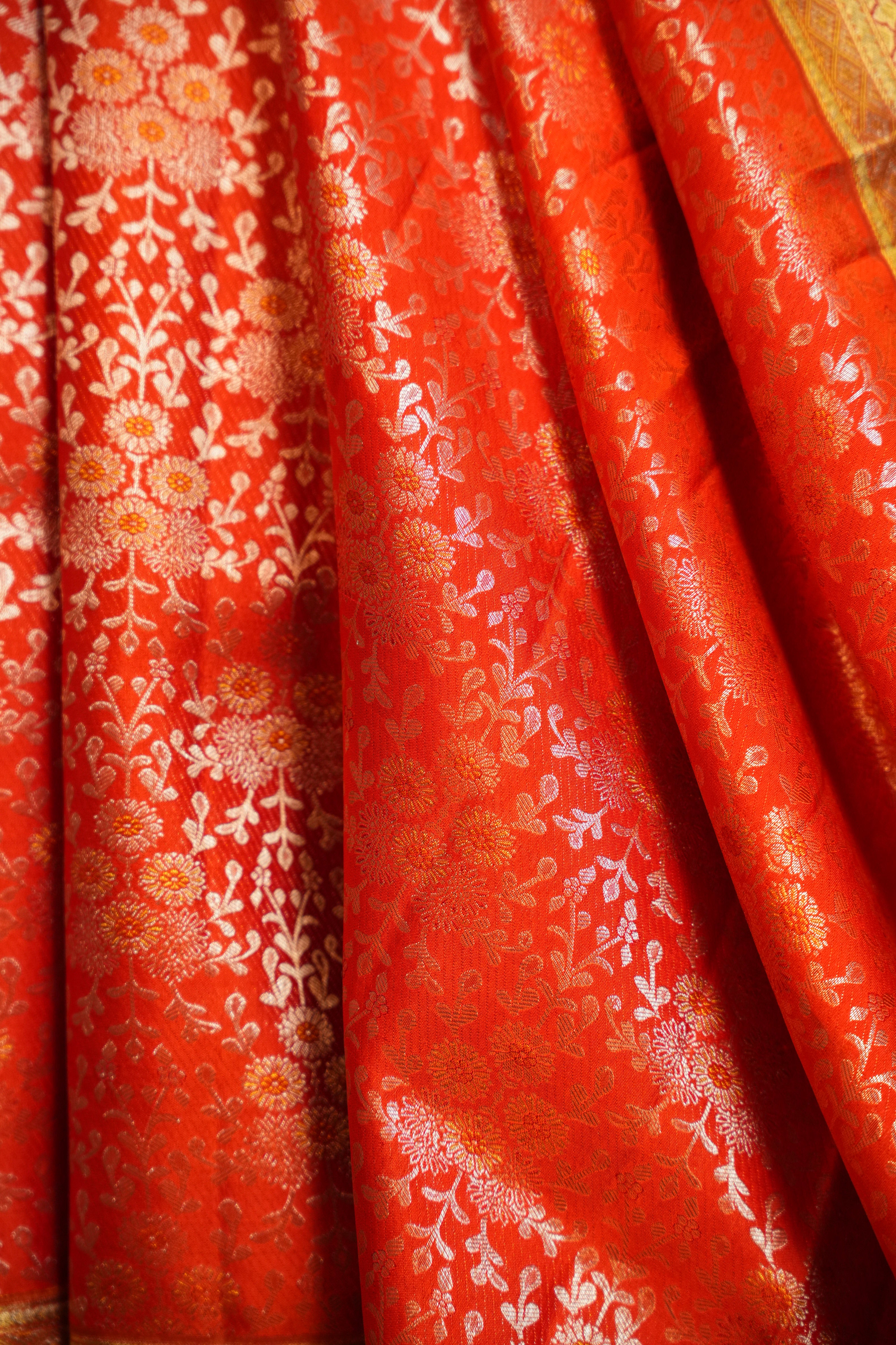Orange Kanchi Meena Border Saree with Peacock Zari Pallu