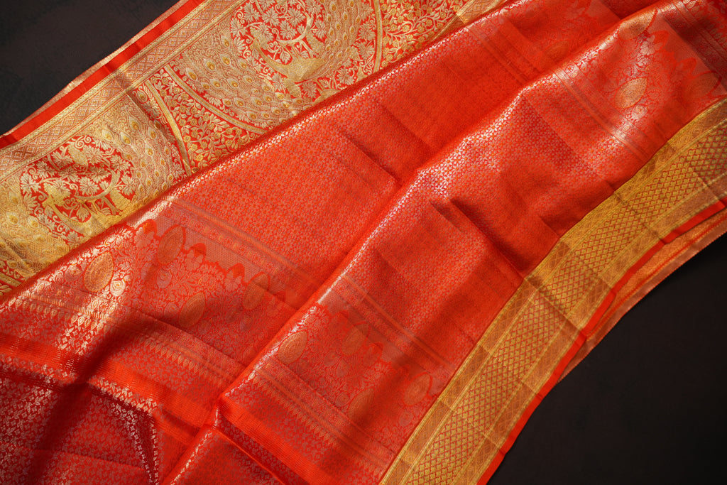 Orange Kanchi Meena Border Saree with Peacock Zari Pallu