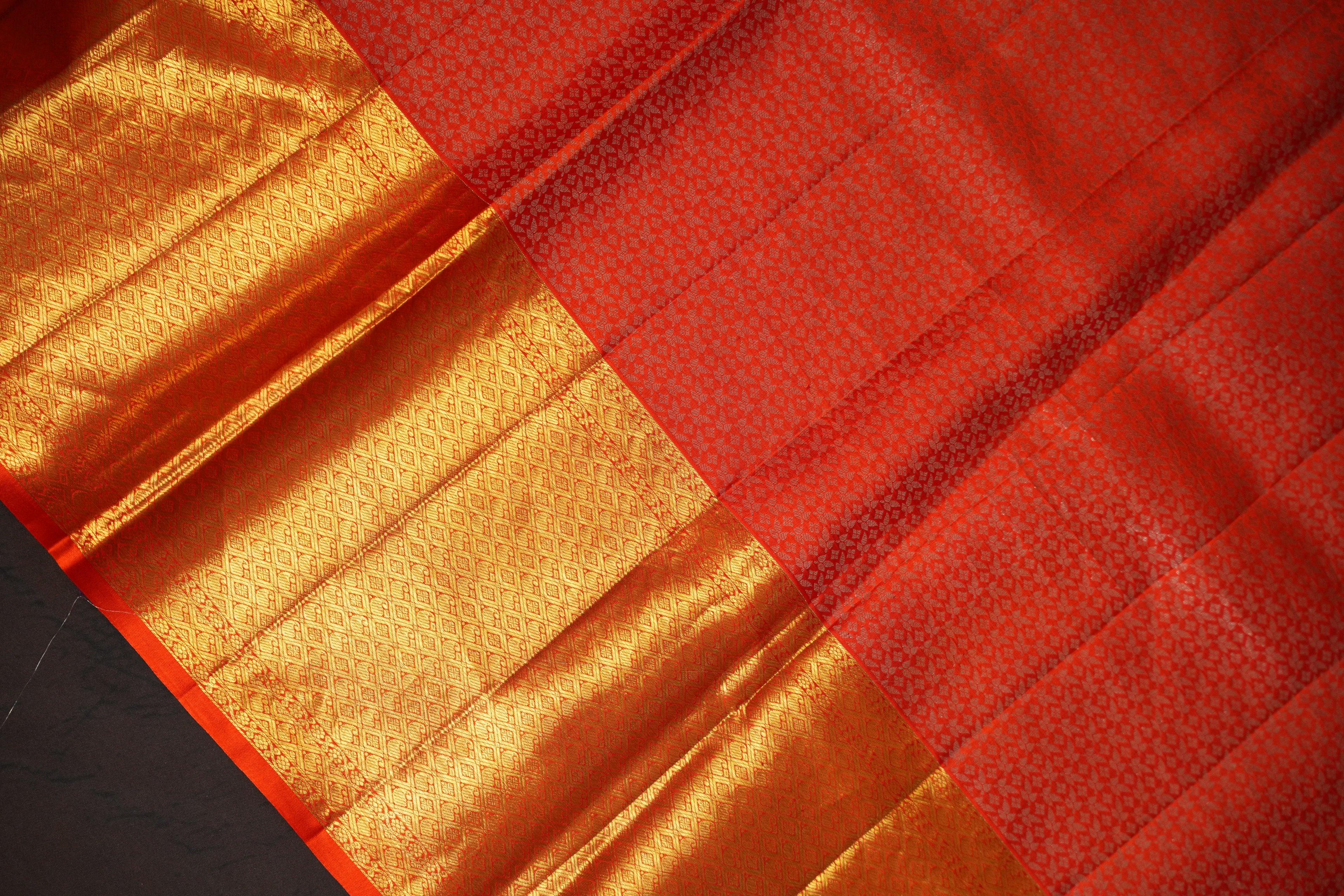 Orange Kanchi Meena Border Saree with Peacock Zari Pallu