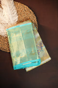 Aqua Blue Pattu Lehanga Saree with Rich Gold Zari Weave
