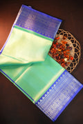 Pastel Green Maharani Pattu Silk Saree with Royal Blue Zari Border
