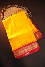 Bright Yellow Gadwal Silk Saree with Red Zari Border