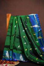 Emerald Green Maharani Pattu Silk Saree with Blue Peacock Border