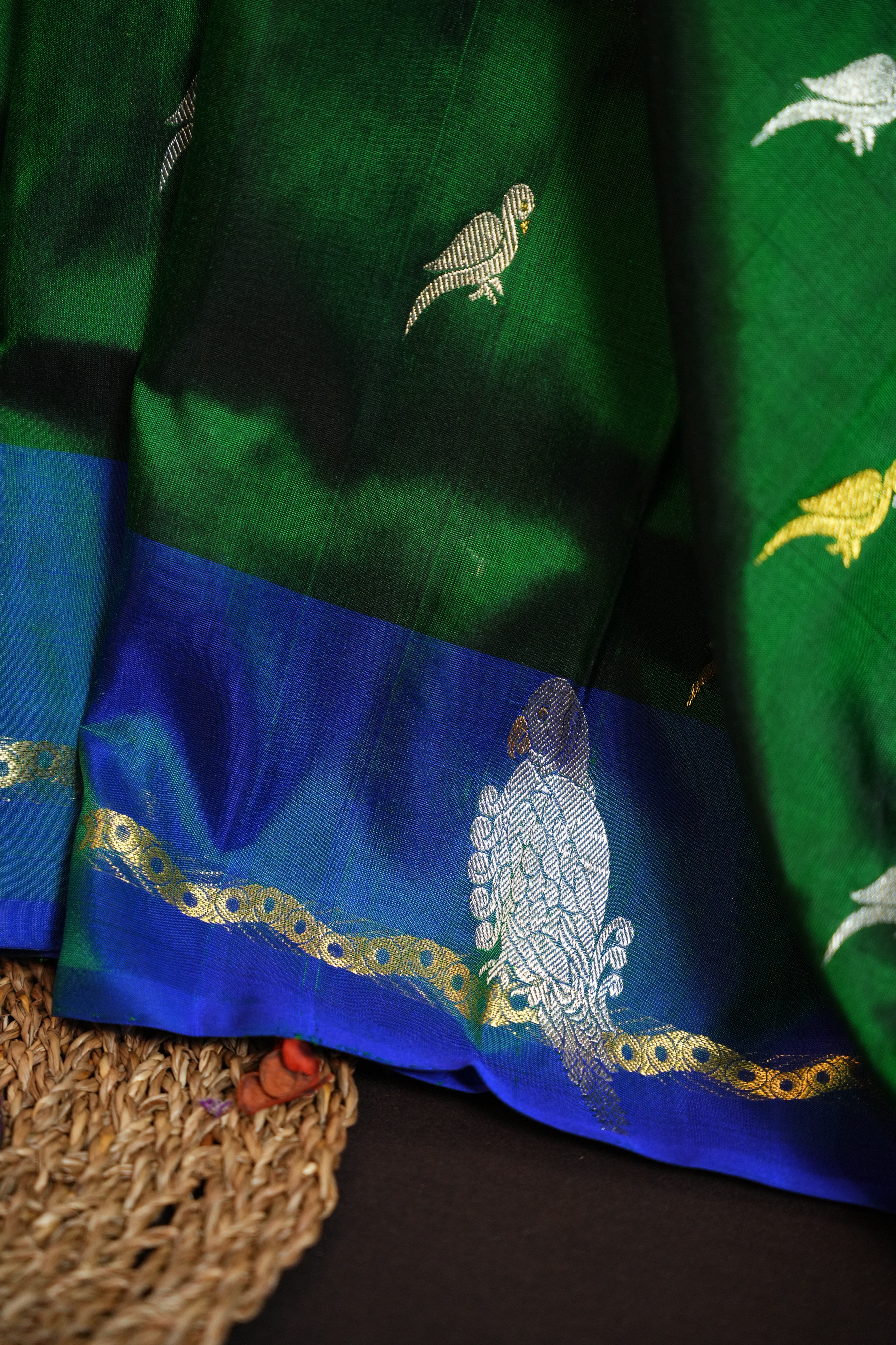 Emerald Green Maharani Pattu Silk Saree with Blue Peacock Border