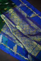Emerald Green Maharani Pattu Silk Saree with Blue Peacock Border