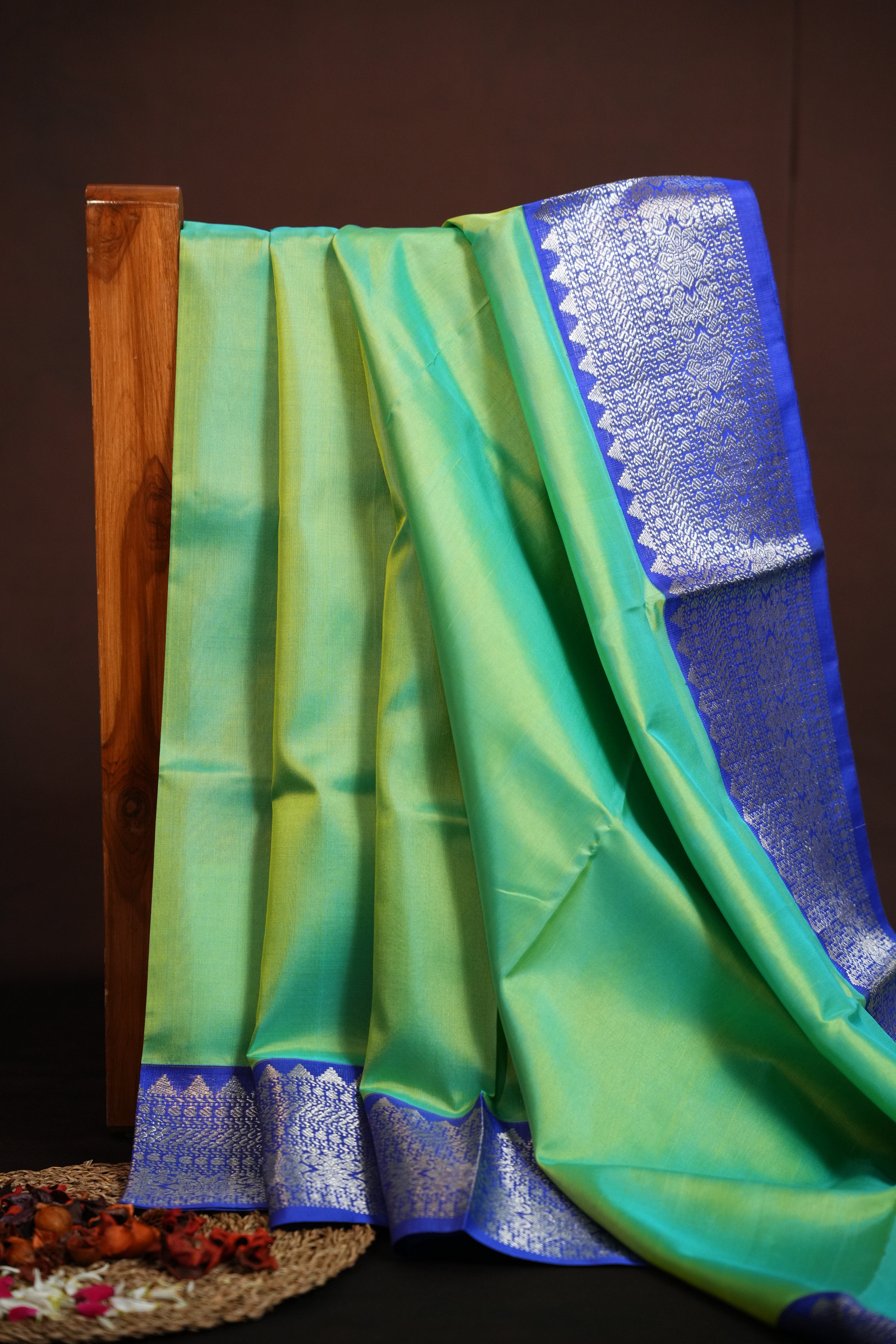 Pastel Green Maharani Pattu Silk Saree with Royal Blue Zari Border