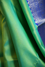 Pastel Green Maharani Pattu Silk Saree with Royal Blue Zari Border