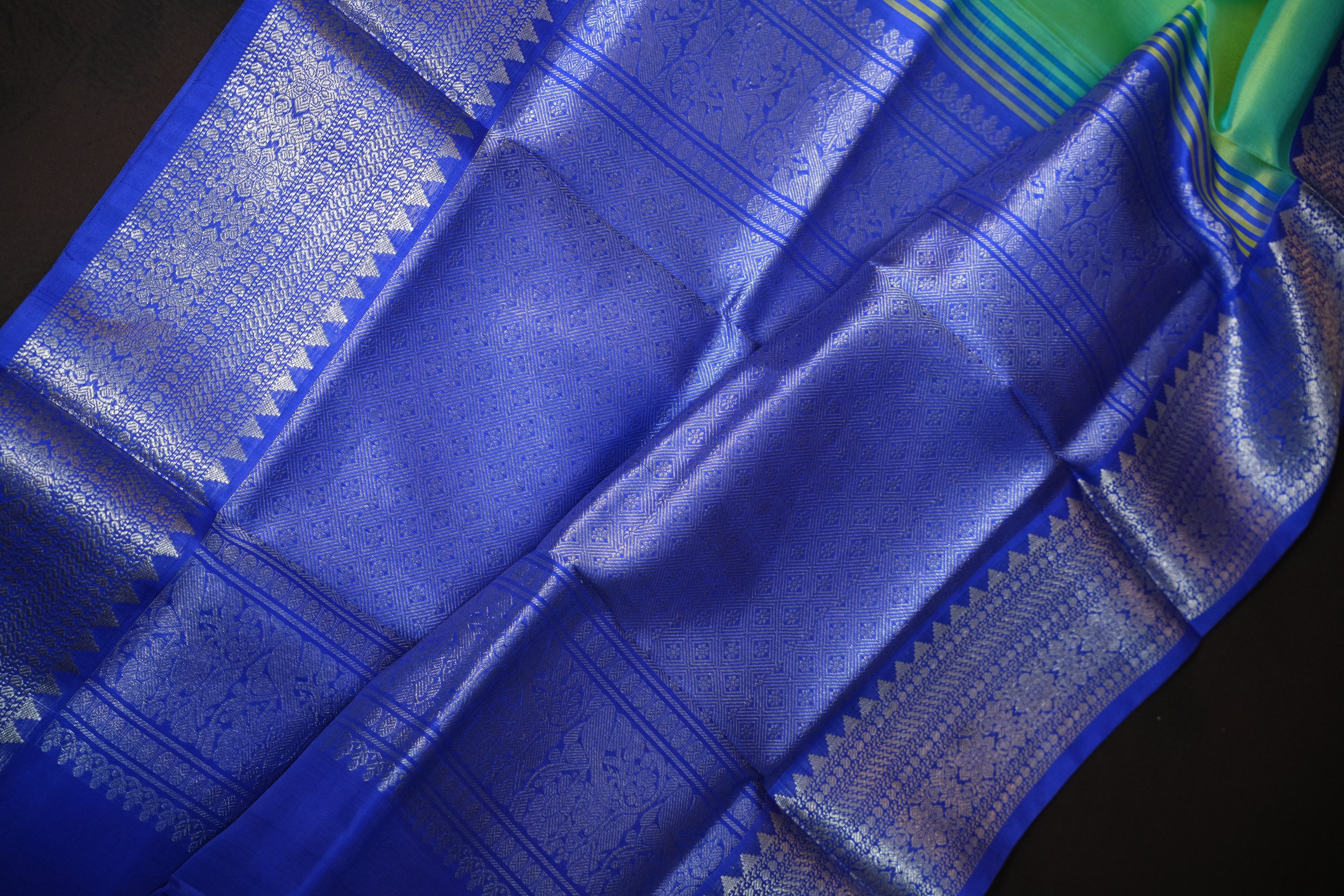 Pastel Green Maharani Pattu Silk Saree with Royal Blue Zari Border