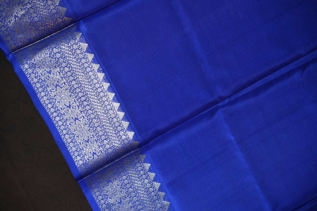 Pastel Green Maharani Pattu Silk Saree with Royal Blue Zari Border