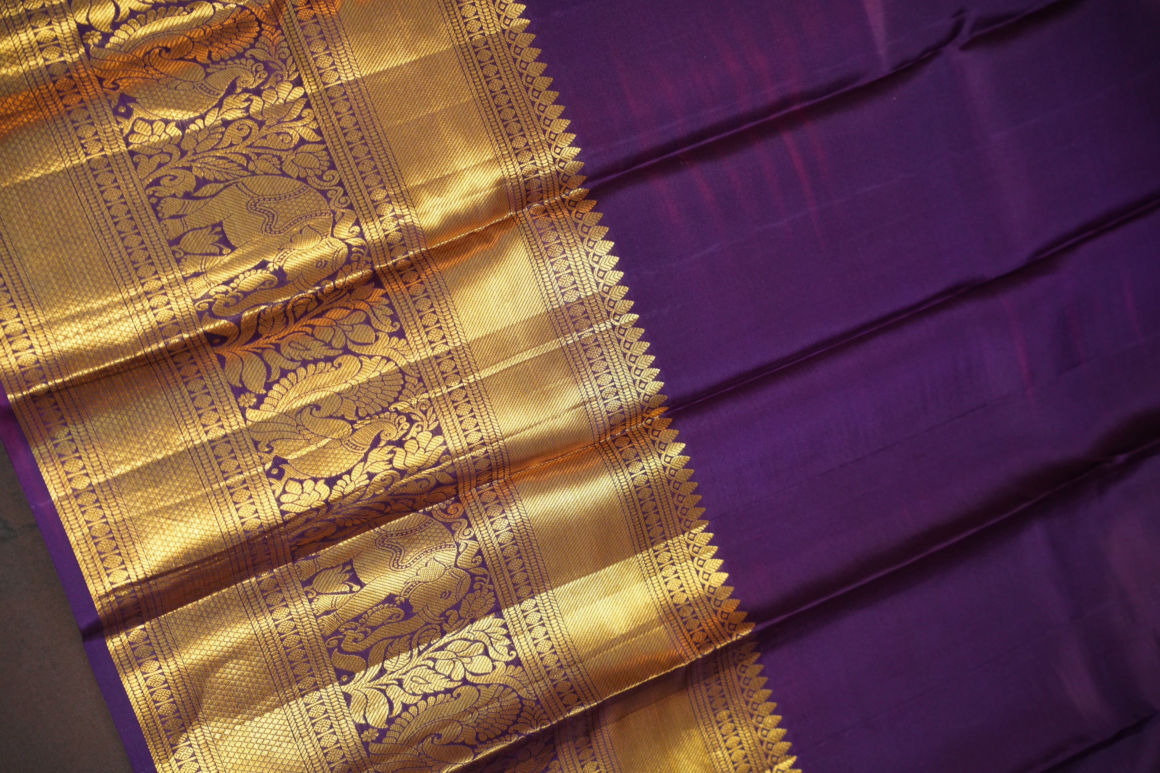Royal Purple Pattu Lehanga Saree with Grand Gold Zari Border