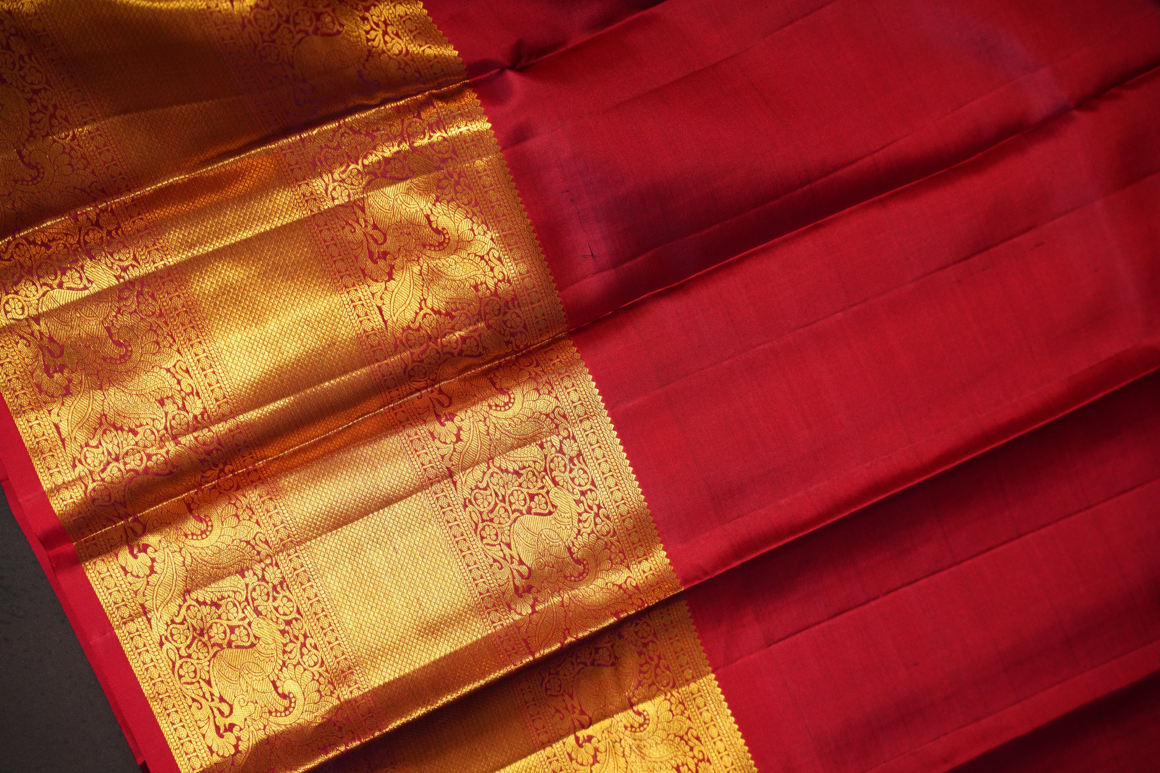 Bridal Red Pattu Lehanga Saree with Rich Gold Zari Work