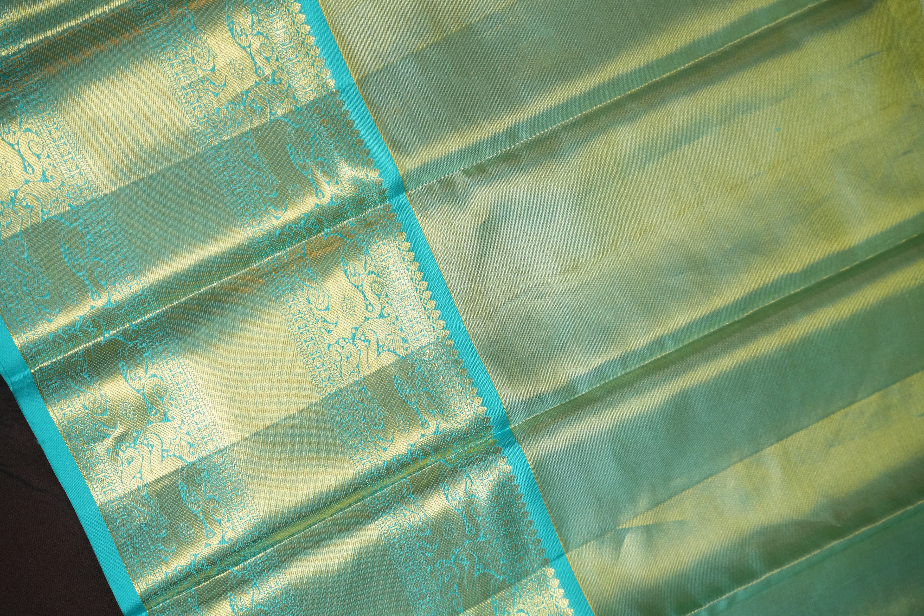 Aqua Blue Pattu Lehanga Saree with Rich Gold Zari Weave