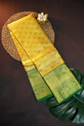 Kanchi Pattu Saree in Mustard Yellow with Green Border