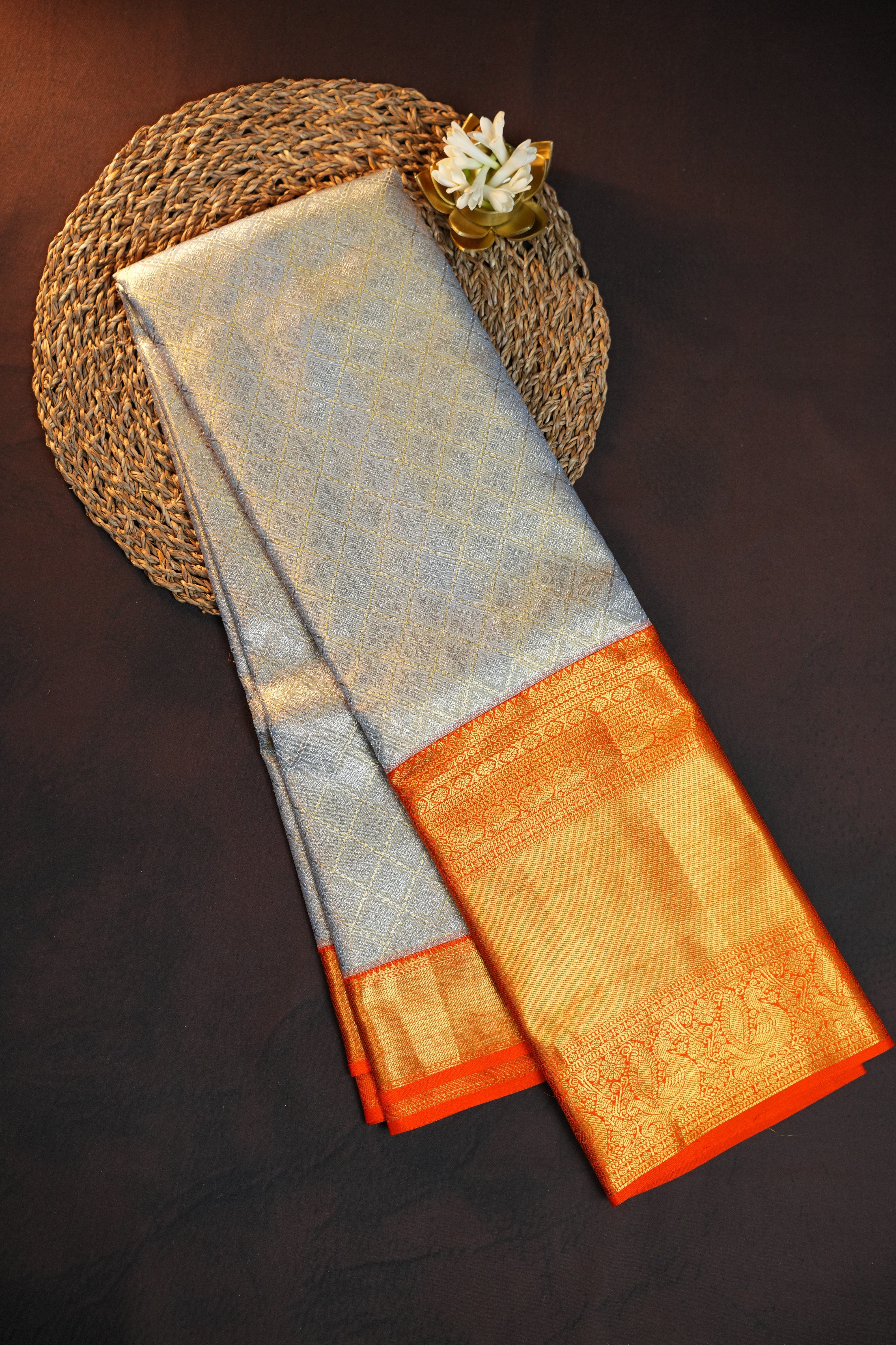 Kanchi Pattu Saree in Silver Grey with Orange Border
