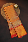 Kanchi Pattu Saree in Copper Gold with Red Border