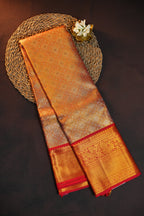 Kanchi Pattu Saree in Copper Gold with Red Border