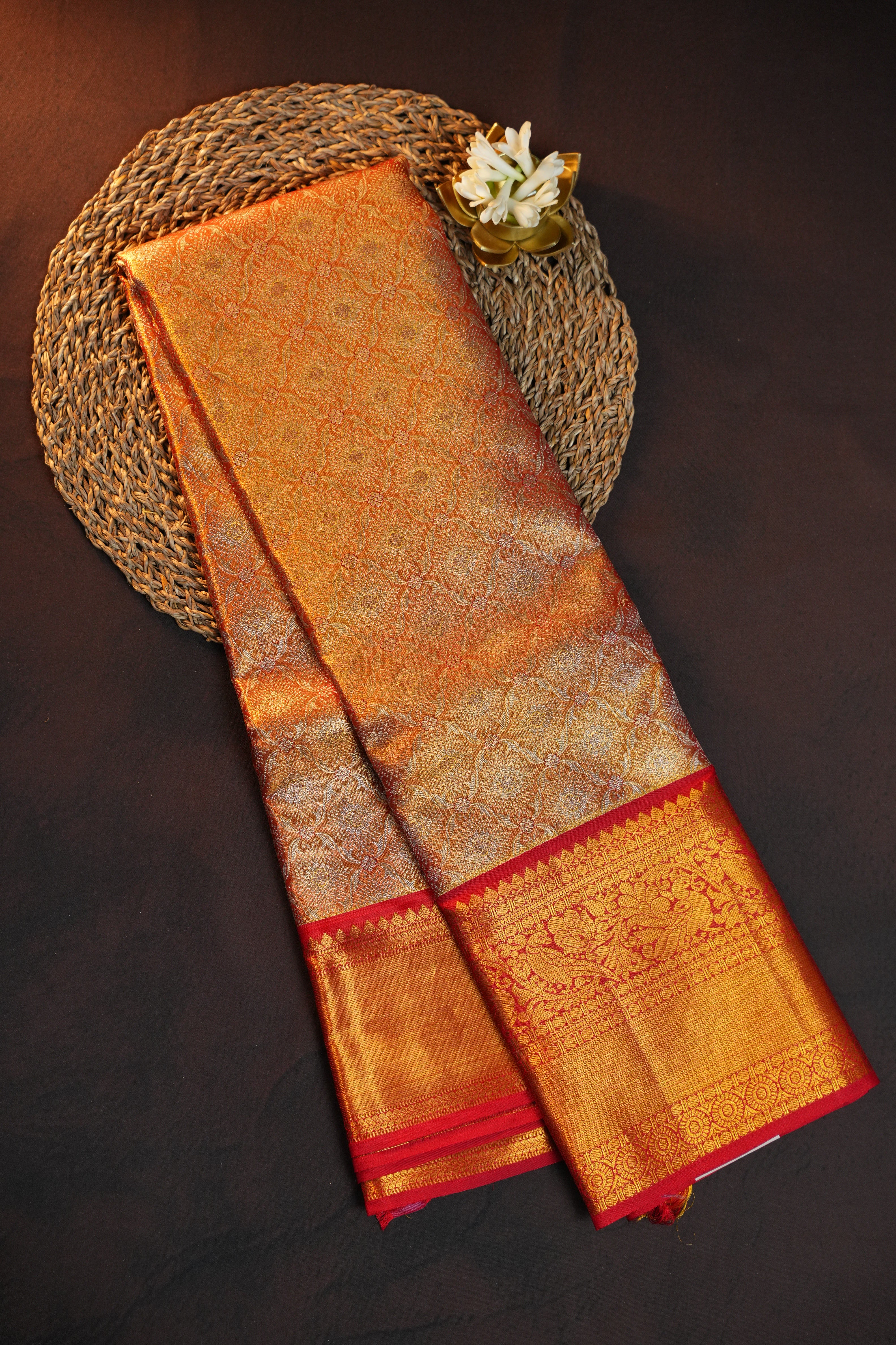 Kanchi Pattu Saree in Copper Gold with Red Border