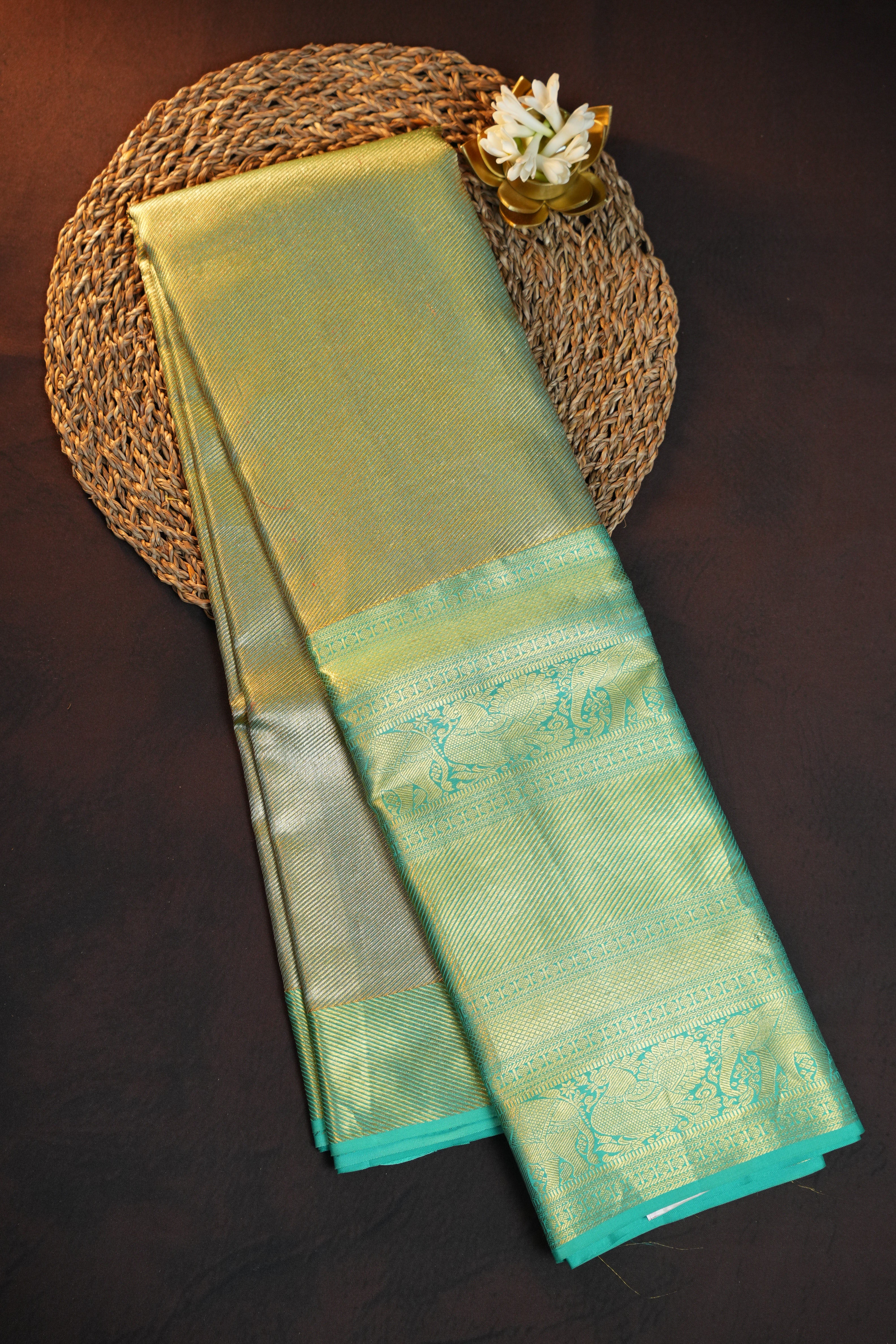 Kanchi Pattu Saree in Olive Gold with Aqua Blue Border
