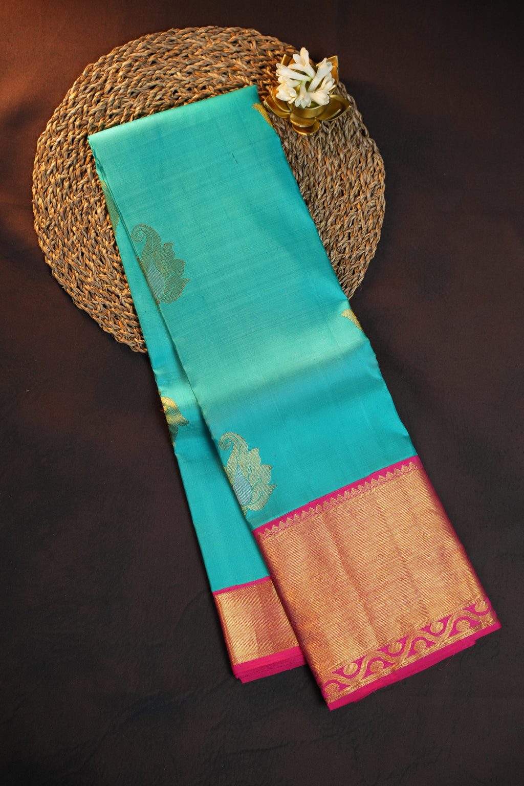 Turquoise Kanchi Pattu Saree with Pink Zari Border