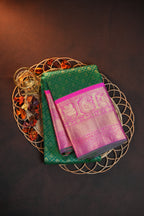 Green Kanchi Pattu Saree with Pink Zari Border