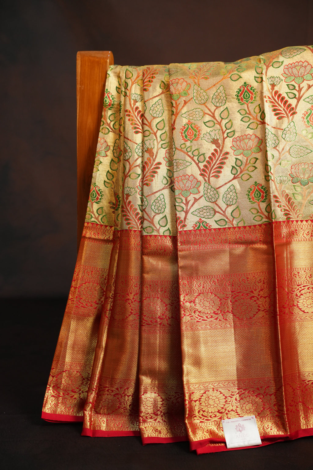 Golden Floral Kanchi Pattu Saree with Rich Red Zari Border