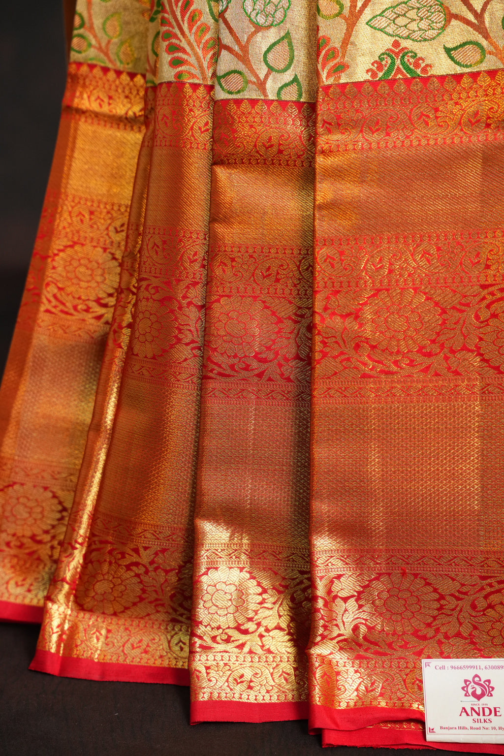 Golden Floral Kanchi Pattu Saree with Rich Red Zari Border