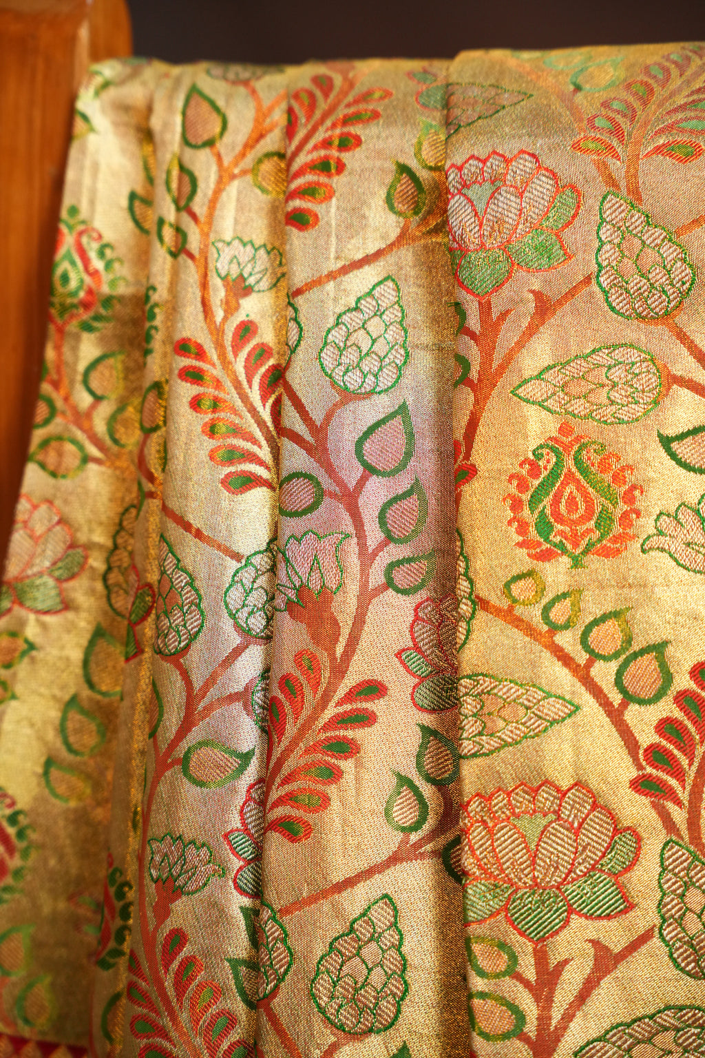 Golden Floral Kanchi Pattu Saree with Rich Red Zari Border