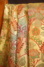 Golden Floral Kanchi Pattu Saree with Rich Red Zari Border