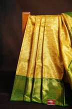 Kanchi Pattu Saree in Mustard Yellow with Green Border