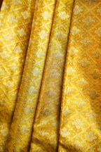 Kanchi Pattu Saree in Mustard Yellow with Green Border