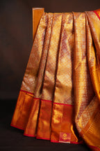 Kanchi Pattu Saree in Copper Gold with Red Border