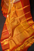 Kanchi Pattu Saree in Copper Gold with Red Border