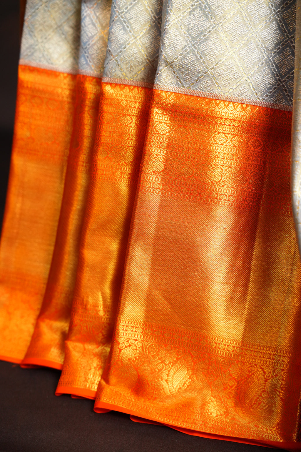 Kanchi Pattu Saree in Silver Grey with Orange Border