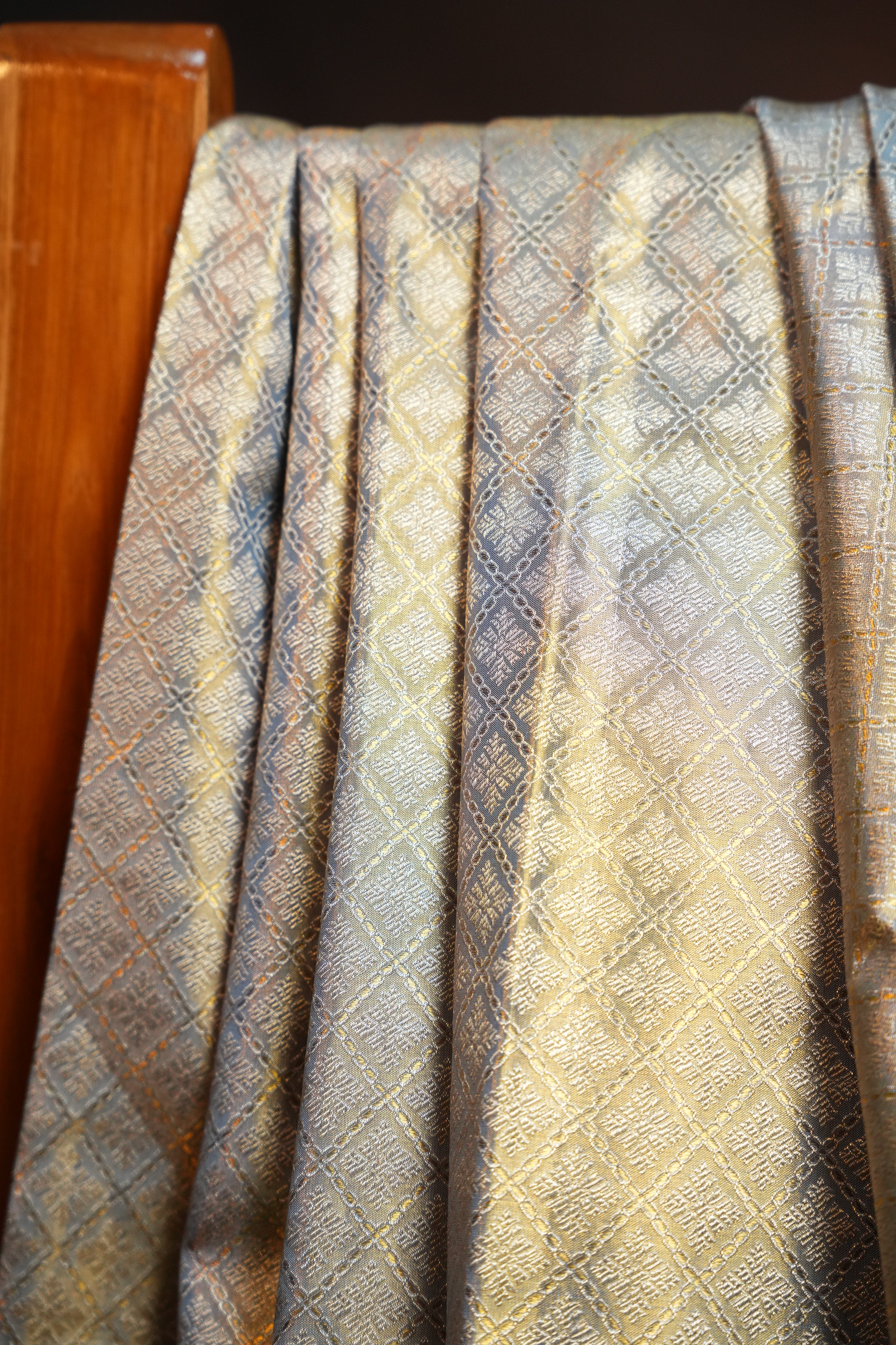 Kanchi Pattu Saree in Silver Grey with Orange Border