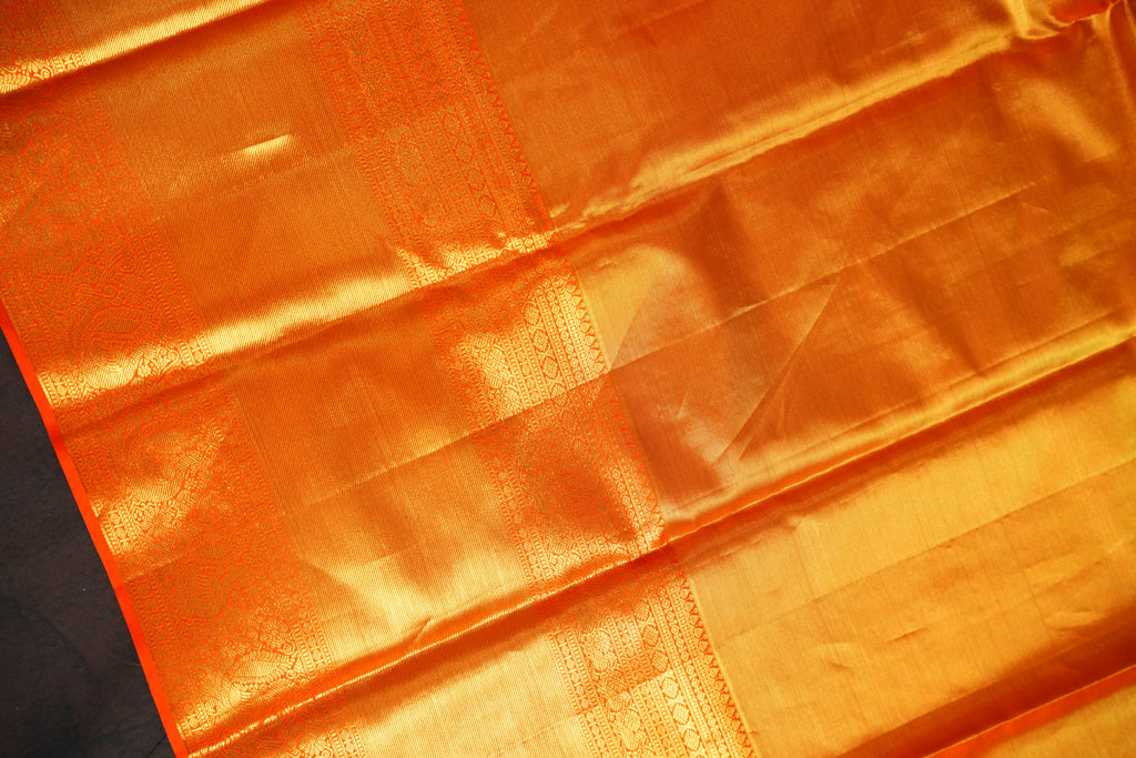 Kanchi Pattu Saree in Silver Grey with Orange Border