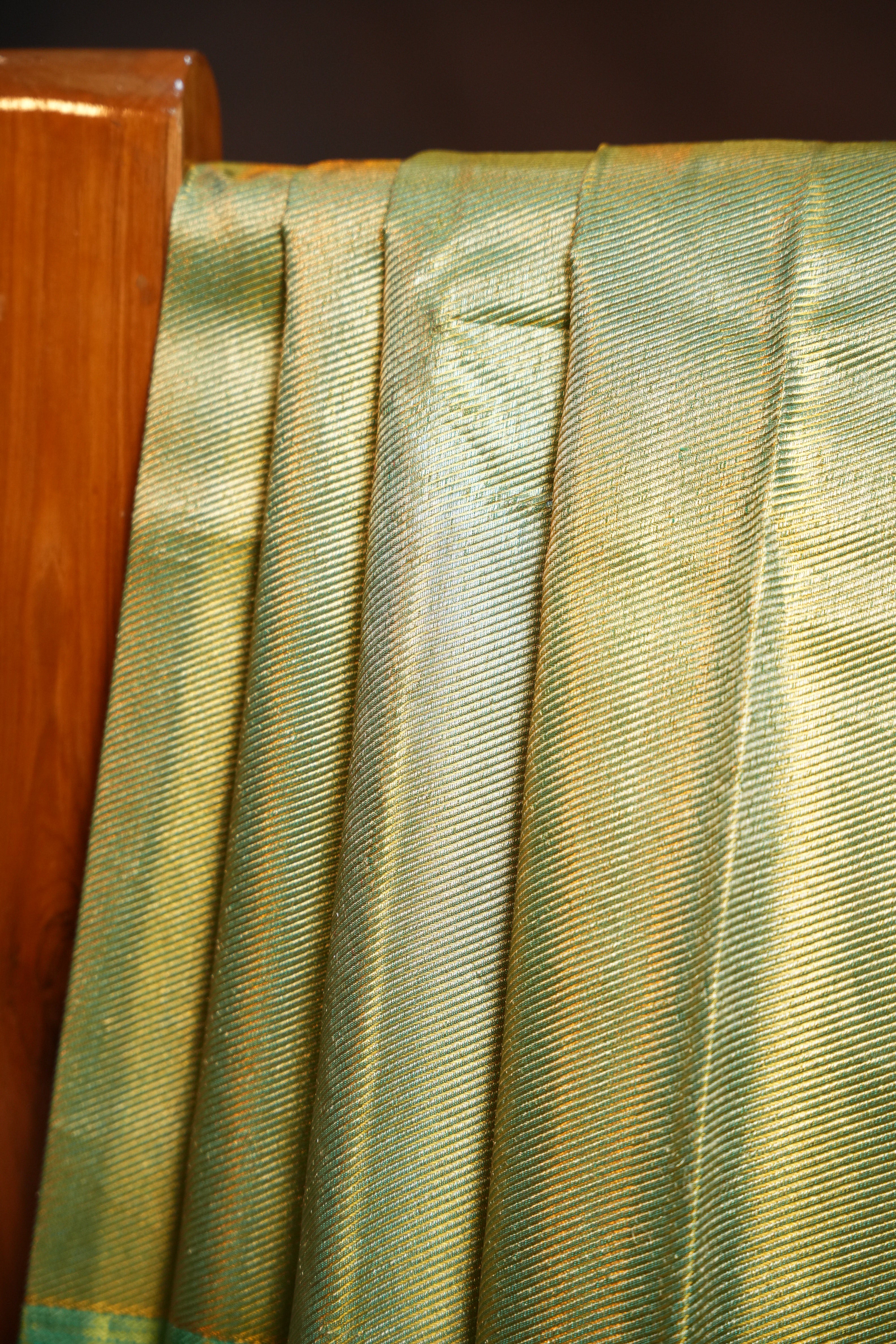 Kanchi Pattu Saree in Olive Gold with Aqua Blue Border