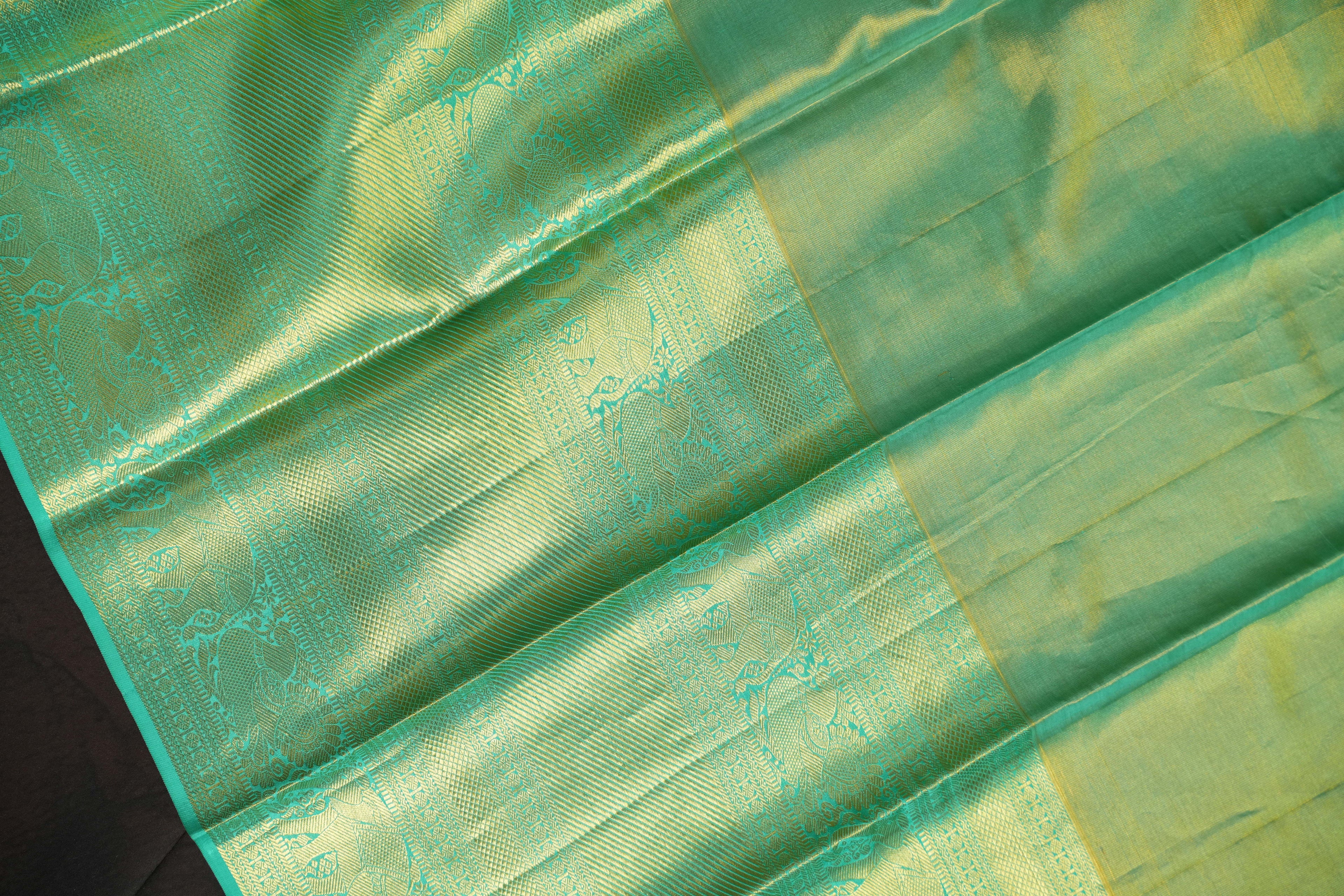 Kanchi Pattu Saree in Olive Gold with Aqua Blue Border