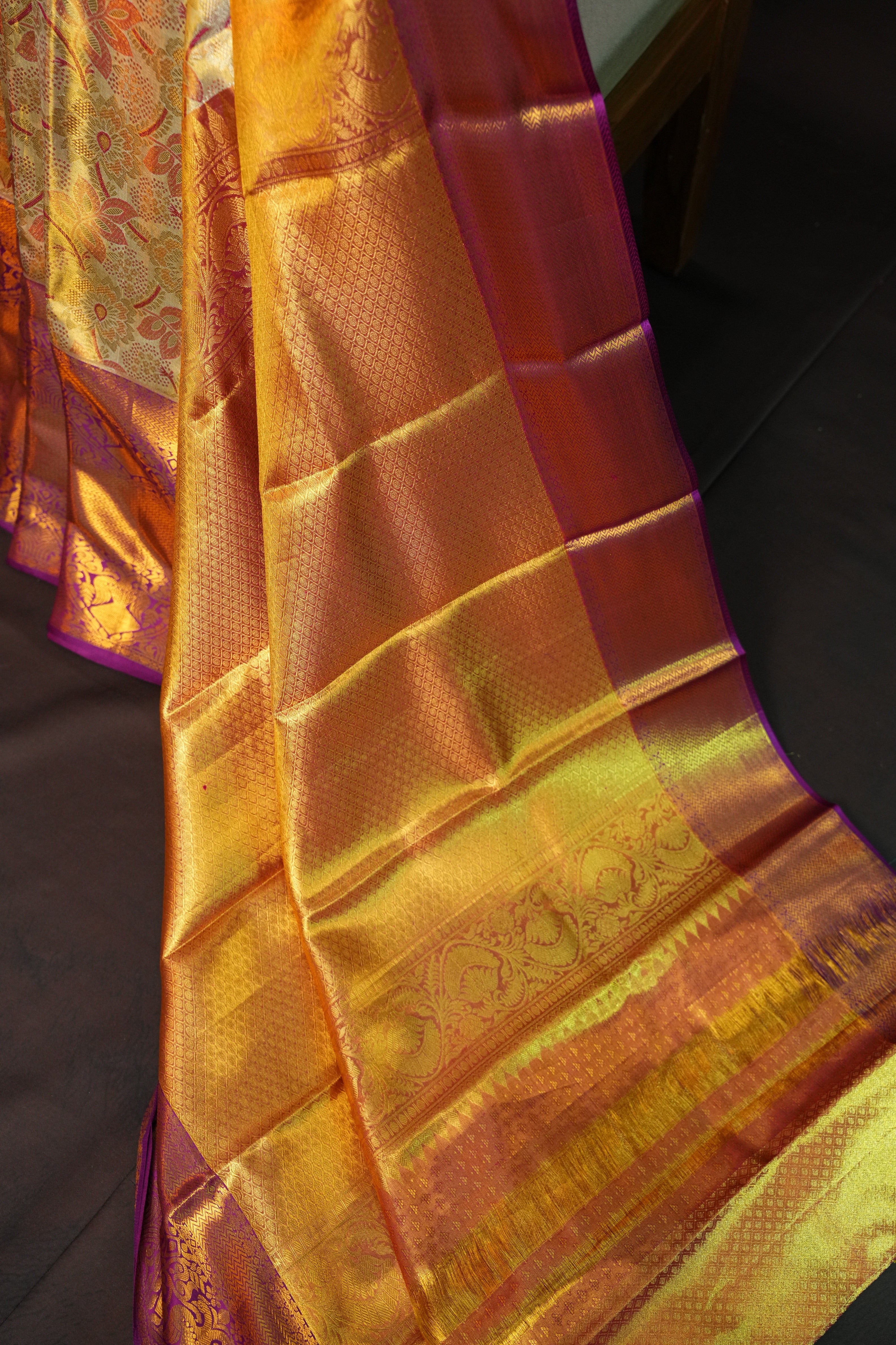 Golden Floral Kanchi Pattu Saree with Royal Purple Border