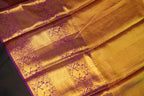 Golden Floral Kanchi Pattu Saree with Royal Purple Border