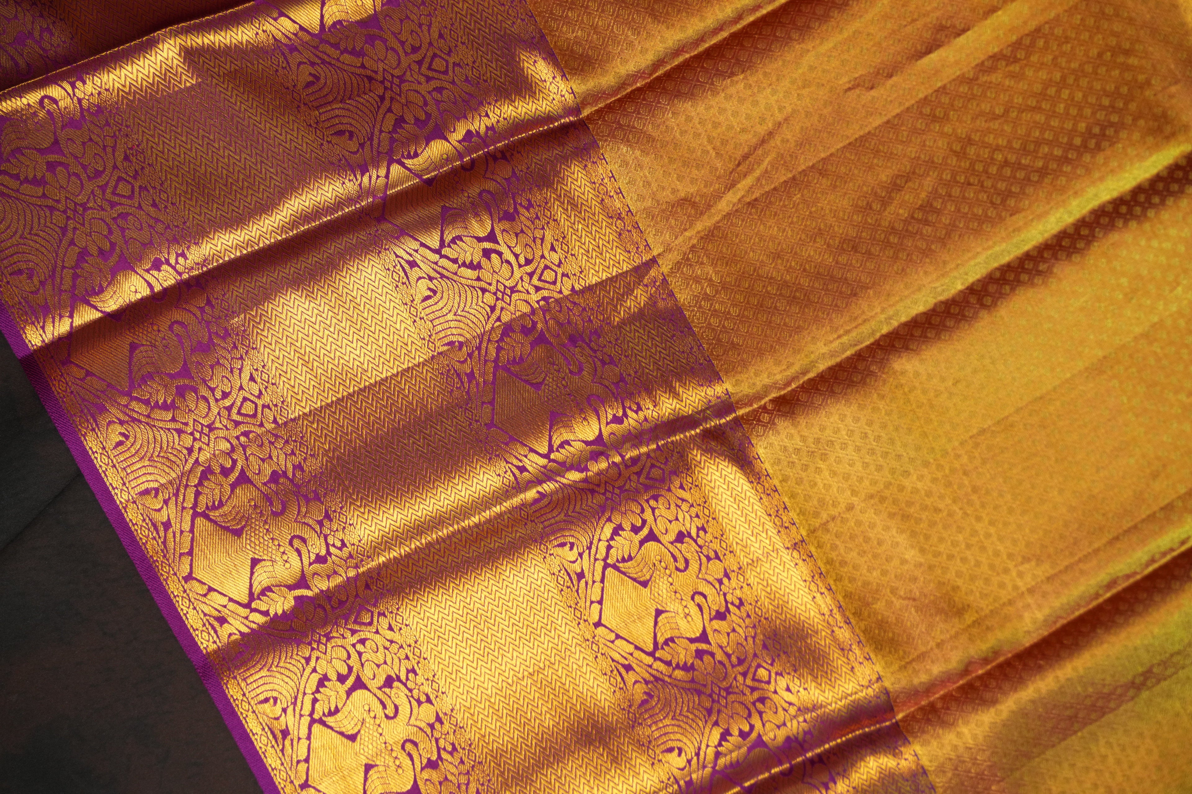 Golden Floral Kanchi Pattu Saree with Royal Purple Border