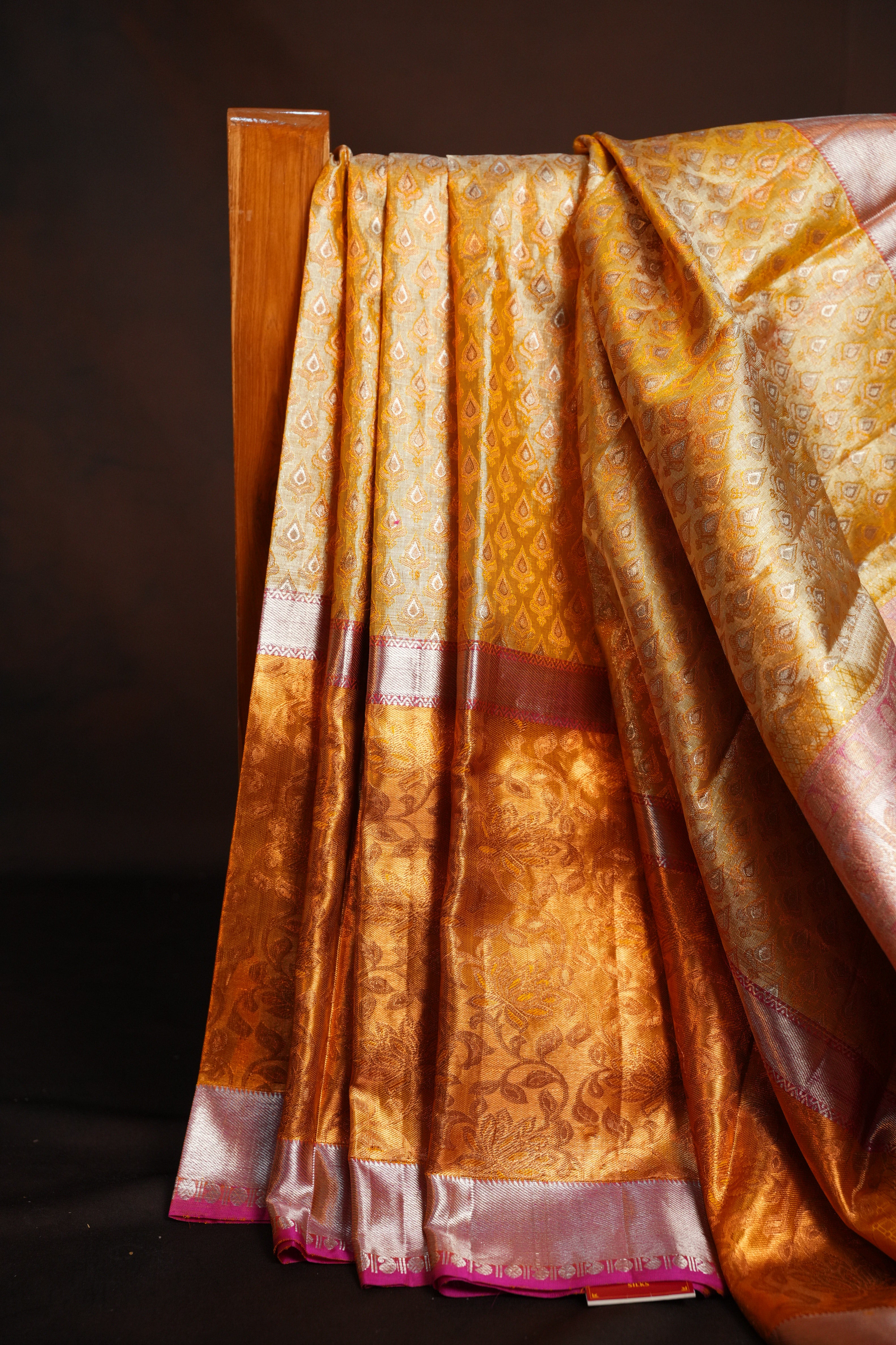 Kanchi Pattu Saree in Golden Beige with Pink Border
