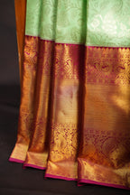 Mint Green Kanchi Pattu Saree with Pink Gold Zari Border