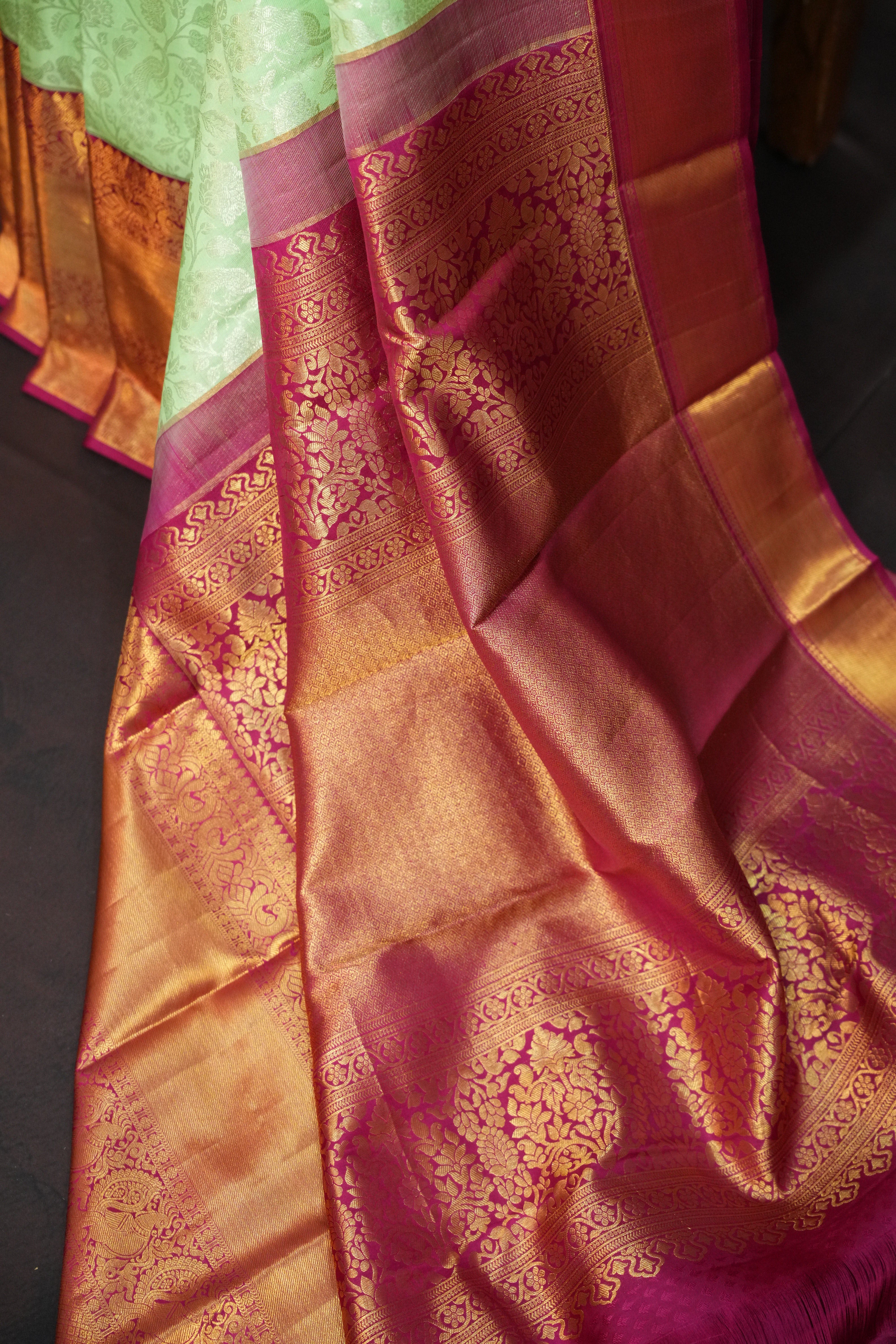 Mint Green Kanchi Pattu Saree with Pink Gold Zari Border