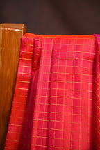 Orange Checks Kanchi Pattu Saree with Purple Border